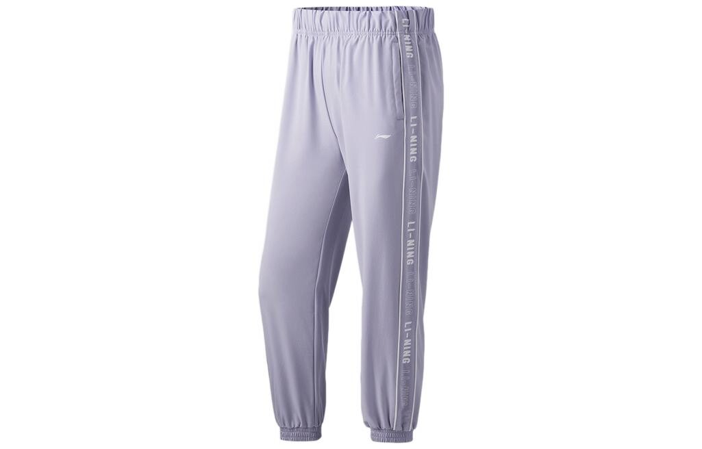 

Трикотажные спортивные штаны женские сиреневые Lining