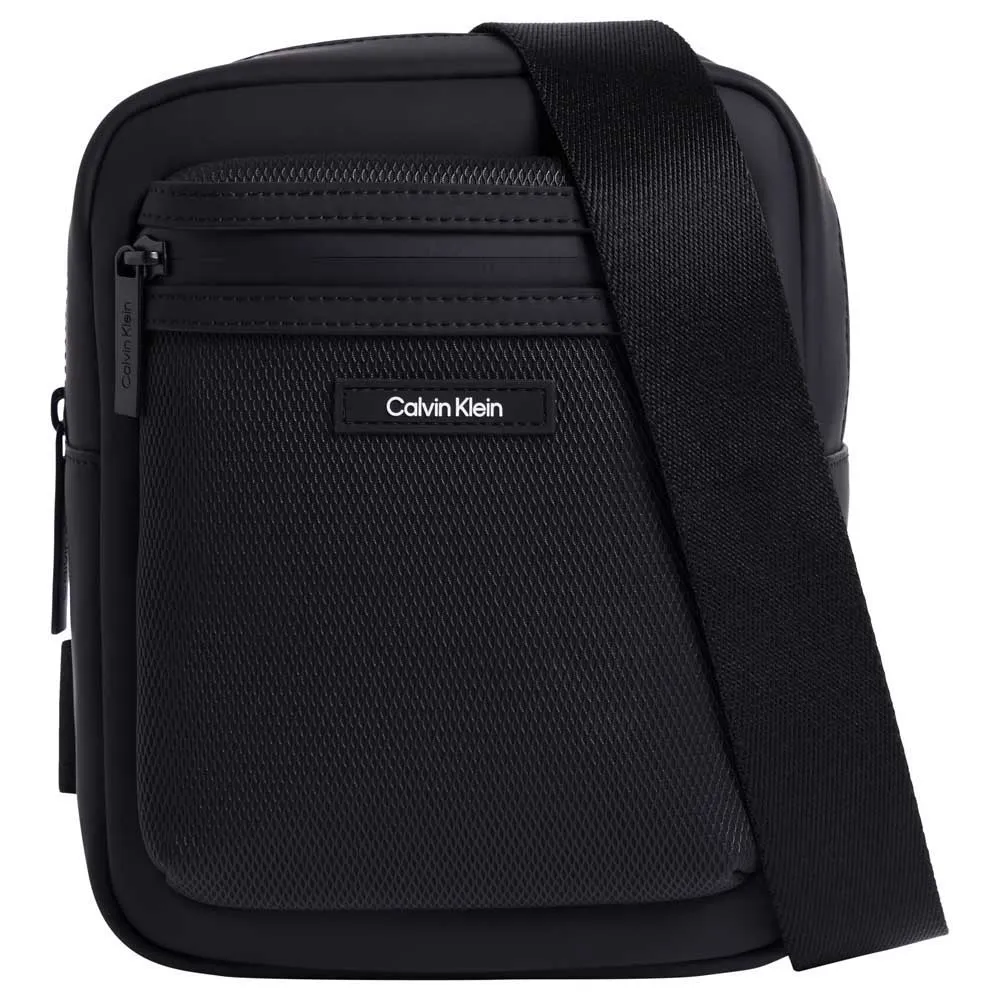 

Сумка кросс-боди Calvin Klein Essential Conv S Rub, черный