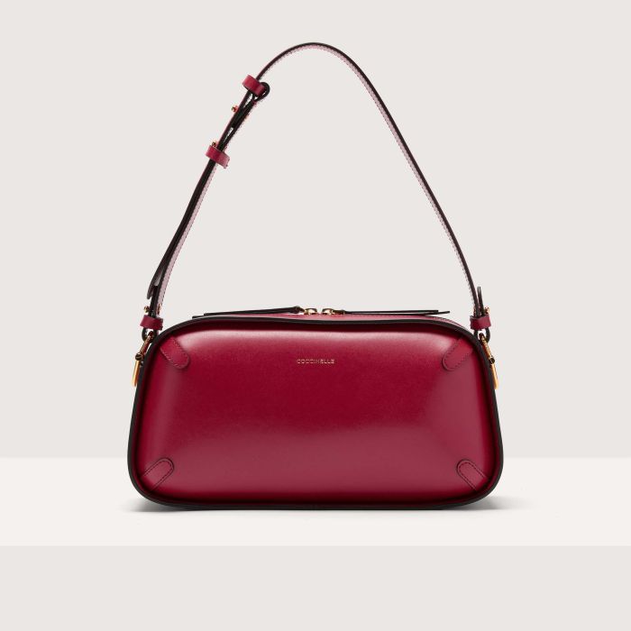 

Сумка через плечо Coccinelle Maleta Calf Cocker medium, цвет Sangria