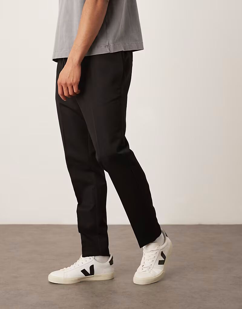 

ASOS DESIGN зауженные книзу брюки черного цвета