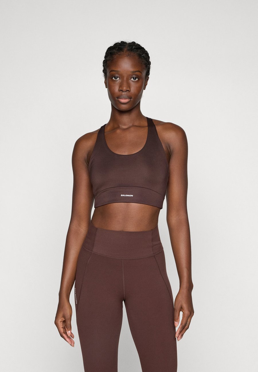 

Бюстгальтер Salomon SHKOUT CORE BRA, Coffee Bean/Light Brown