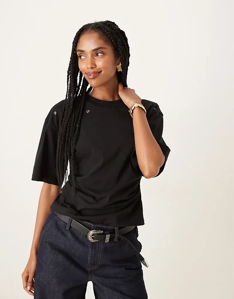 

Футболка ASOS DESIGN с корсетной талией и отделкой из колец-заклепок черного цвета