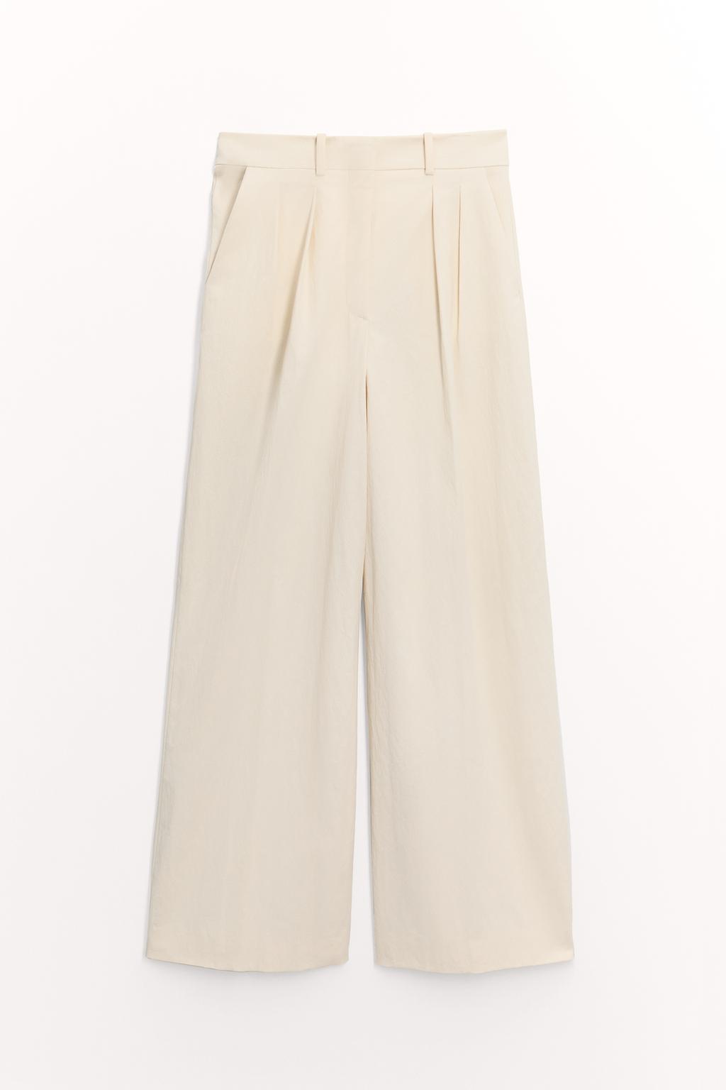 

Заштопанные брюки ZARA, цвет Light tan