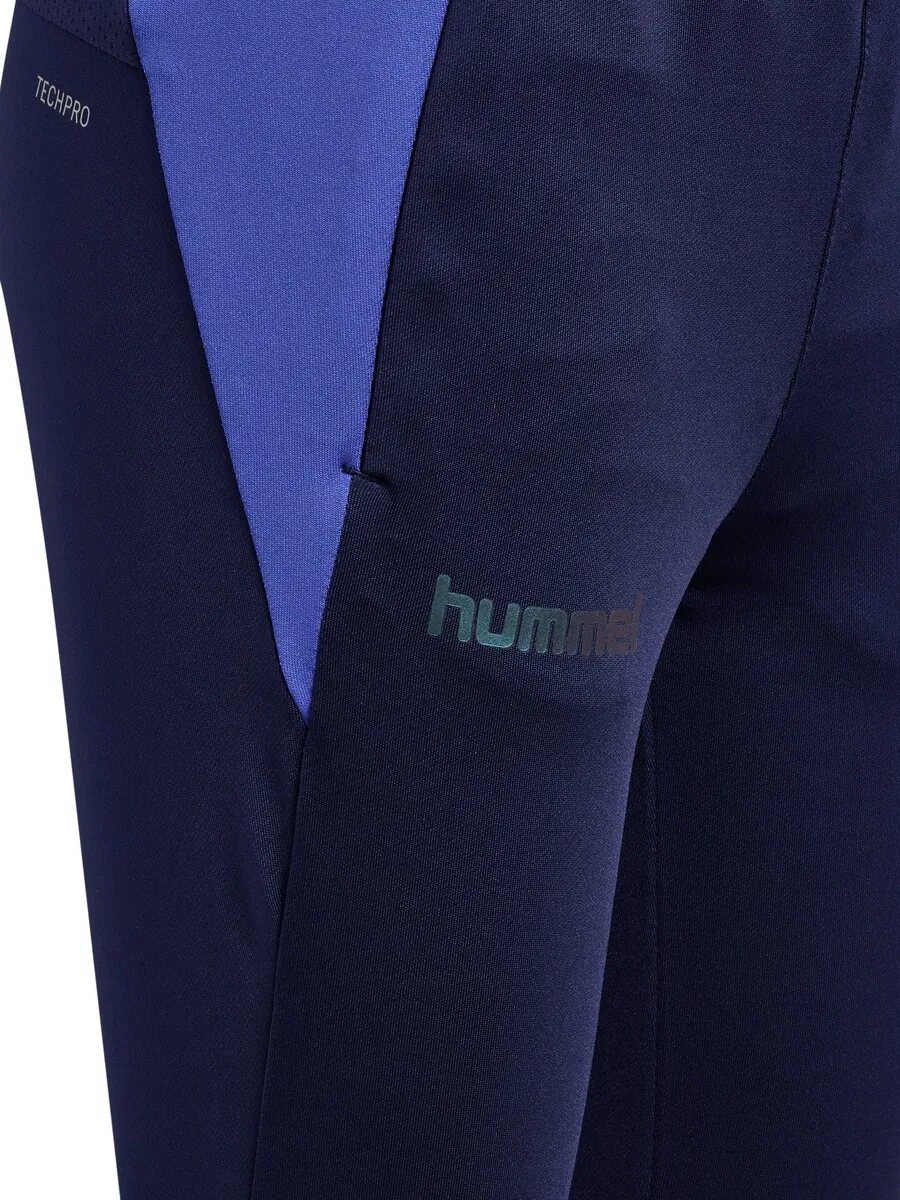 Узкие спортивные брюки Hummel 'BLAZE26 PRO' темно-синего цвета — фото 4