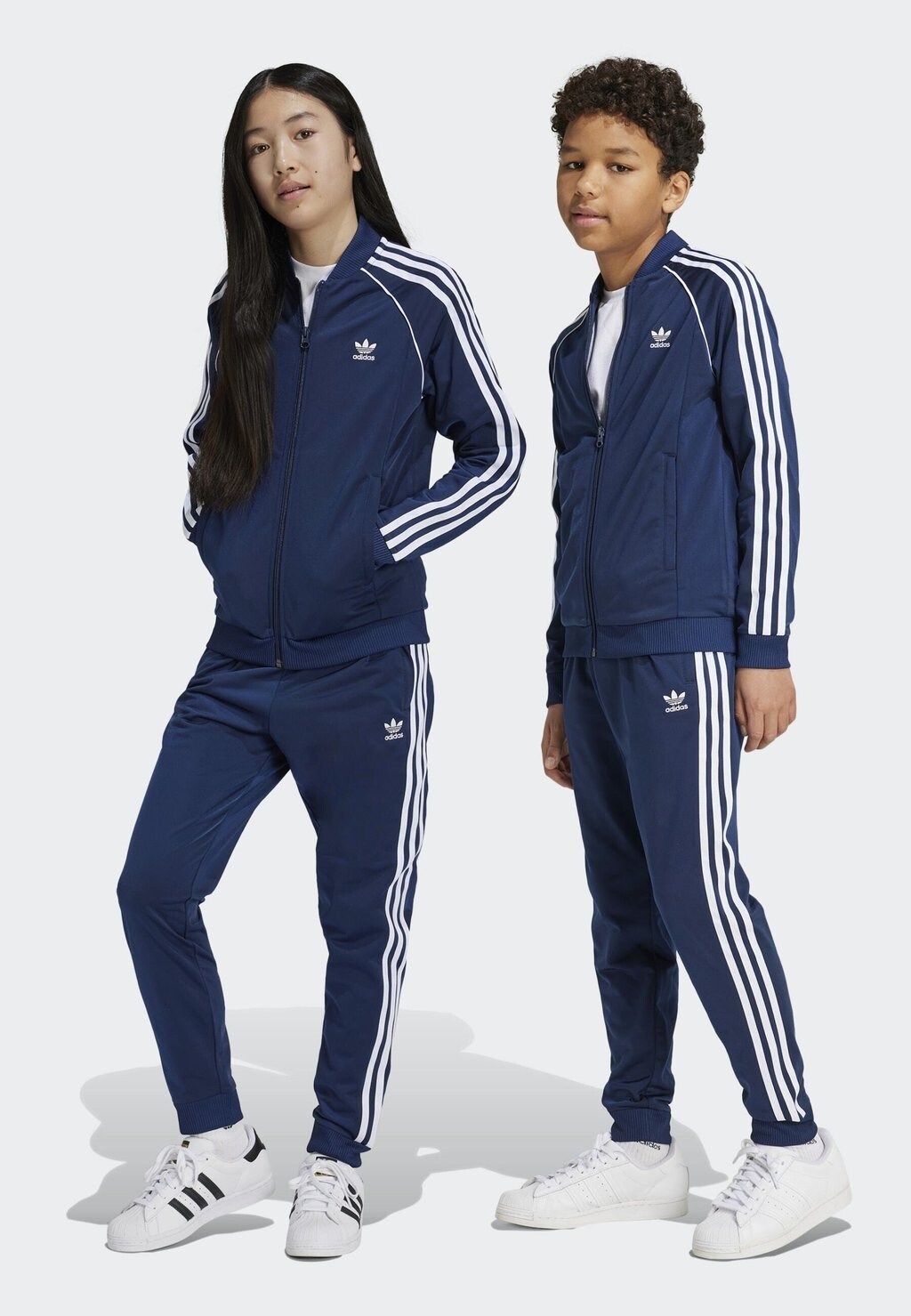 

Спортивные брюки Super Star Trackpant Unisex adidas Originals, темно-синий