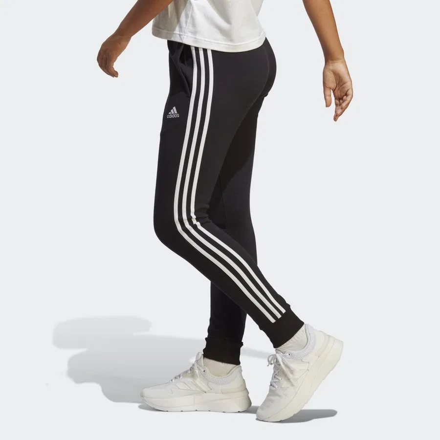 Женские спортивные брюки с манжетами, модель Essentials 3-Stripes, adidas, Черно-белый — фото 2