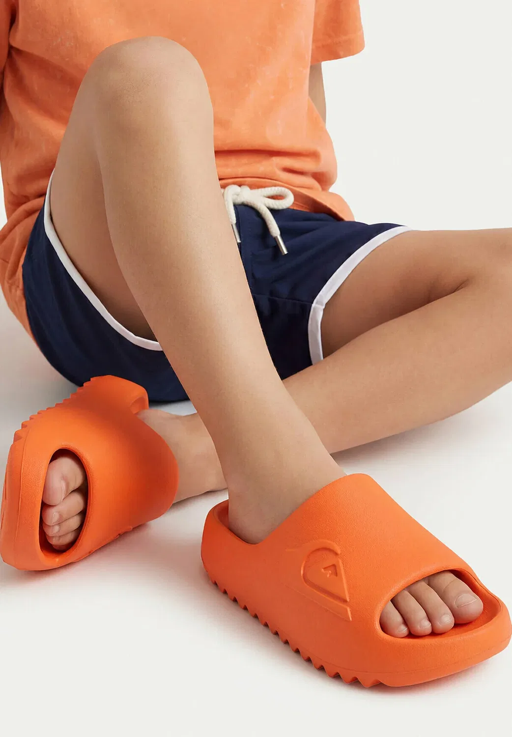 Девушка в шлепанцах 5906751570821 - горки для бассейна Quiksilver, Orange