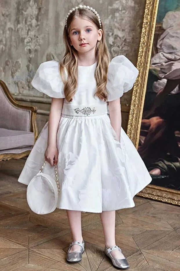 Детское платье для девочек сатиновое с моделью Girl'S white satin evening dress with diamond-studded waistband, ribbon belt detail, leaf embroidery, and balloon sleeves Riccotarz, White