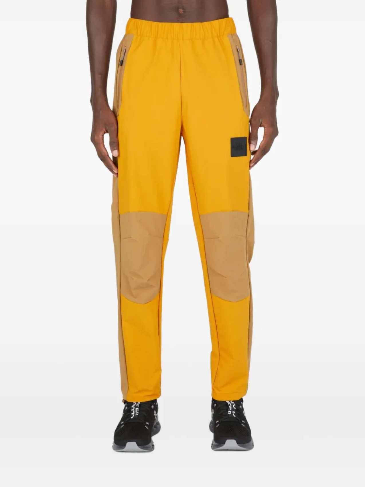 

Легкие брюки-ракушки The North Face, оранжевый