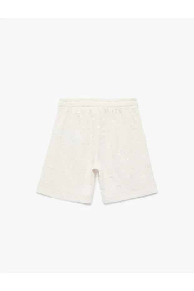 Детские шорты для мальчиков хлопковые Basic cotton shorts with lace-up waist Koton, Beige — фото 3