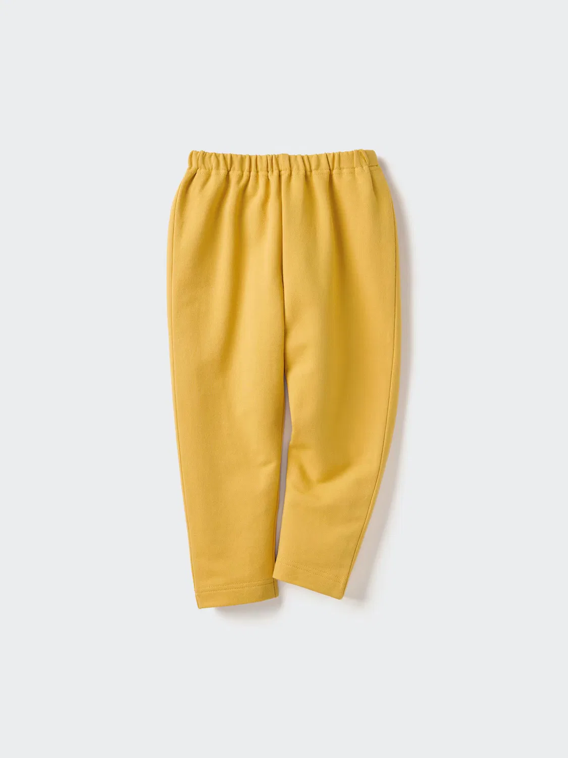 Леггинсы Uniqlo, свободный крой, желтый