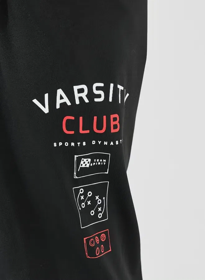 Комплект футболка оверсайз с принтом и джоггеры Varsity print Styli, черный — фото 3