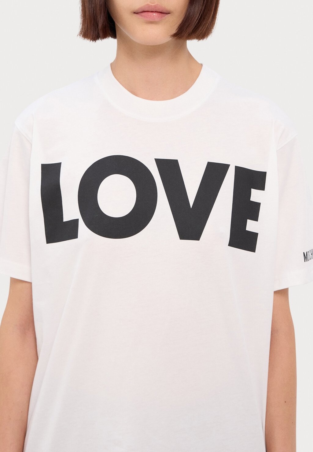 

Принт на футболке MOSCHINO, белый