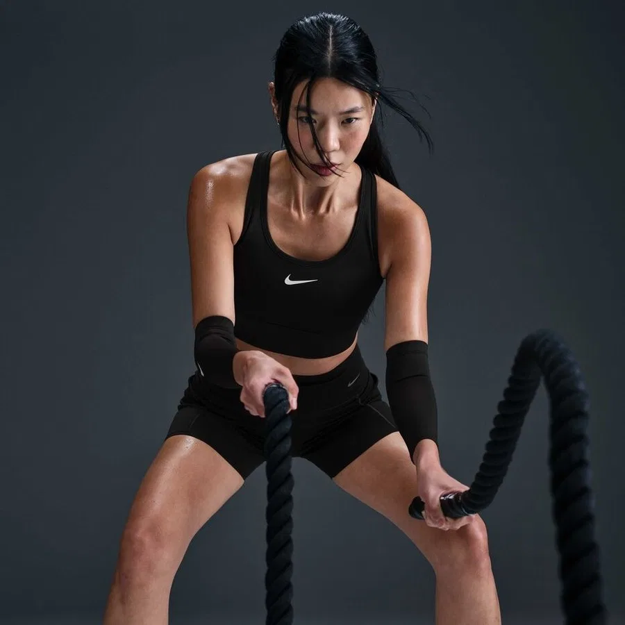 Спортивный бюстгальтер с карманом Swoosh Pocket Medium Support Nike, Черный