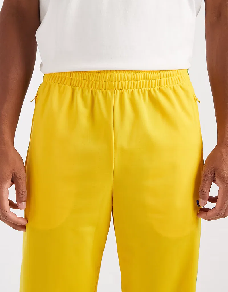 Спортивные брюки Adidas Originals Firebird желтого и, зеленый — фото 4