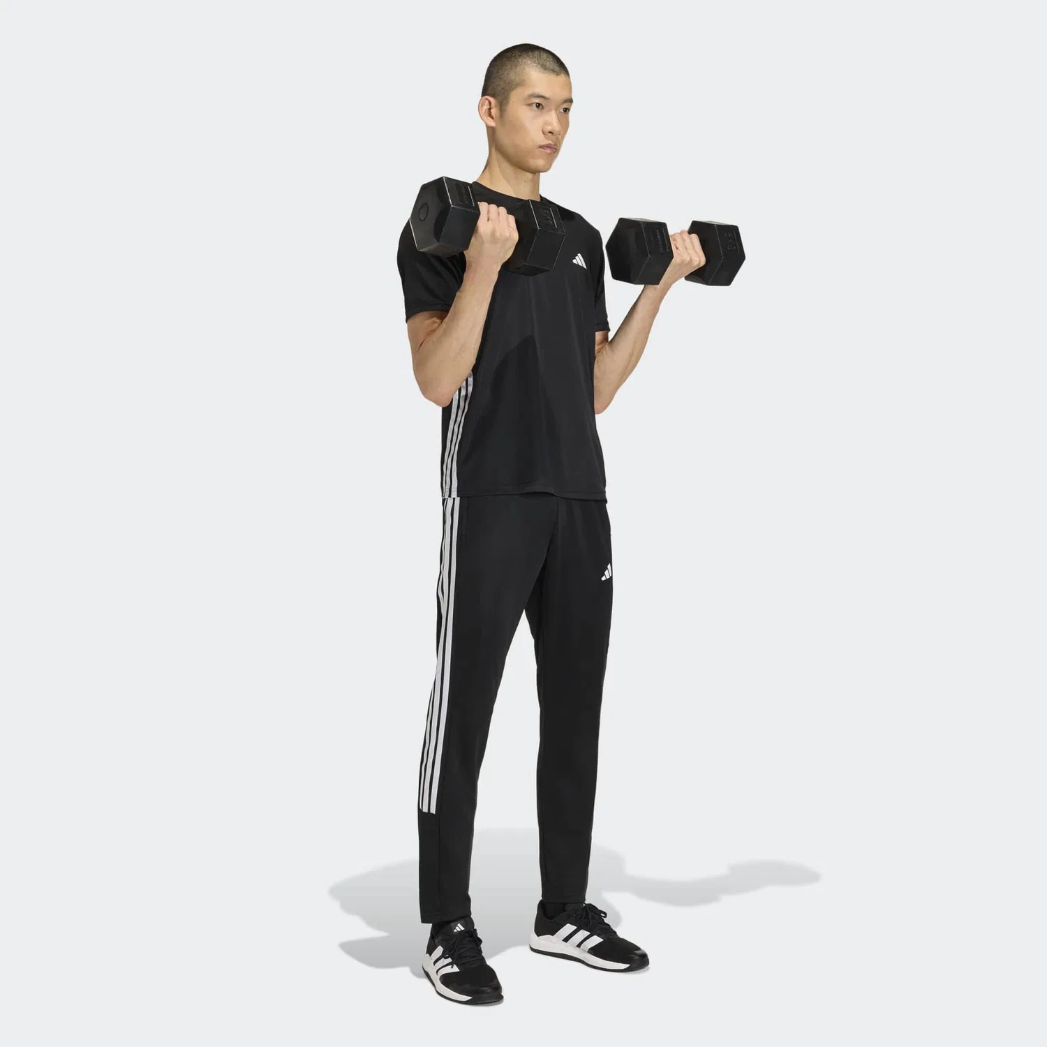Мужские спортивные штаны с зауженным кроем Adidas, Schwarz — фото 2