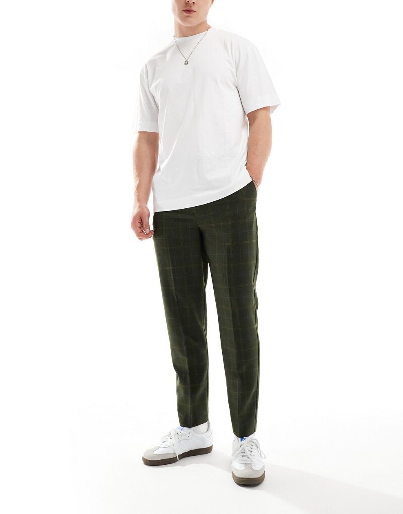

Зеленые зауженные брюки в клетку ASOS DESIGN