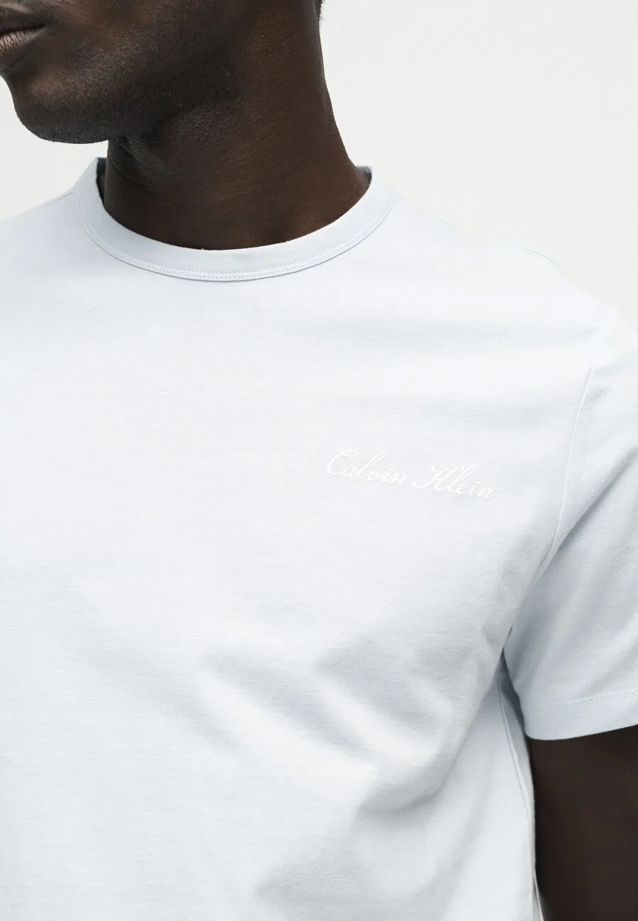 Футболка Calvin Klein светло-голубого цвета — фото 3