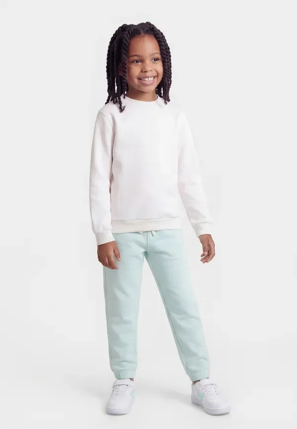 Брюки из хлопка Small logo - tracksuit bottoms New Balance, cosmic jade