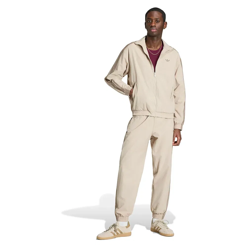 Мужские спортивные брюки из трикотажа Firebird Woven Track Adidas Originals, Beige — фото 4