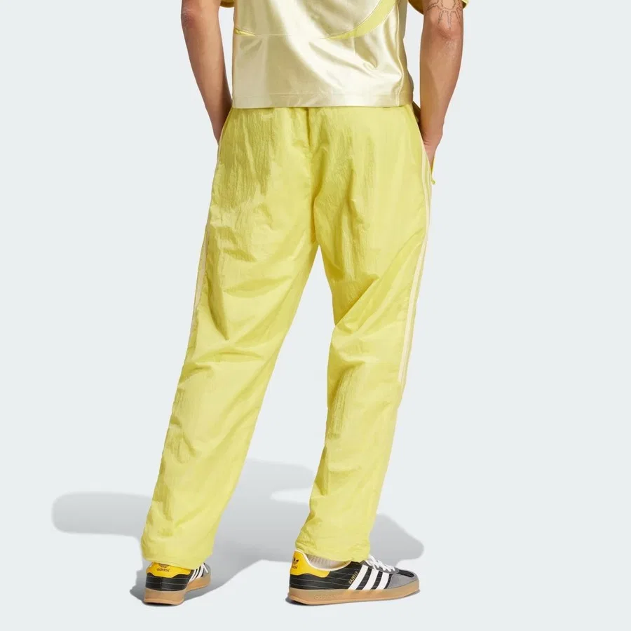 Спортивные штаны свободного кроя Adicolor 2000s Woven adidas, Желтый — фото 2