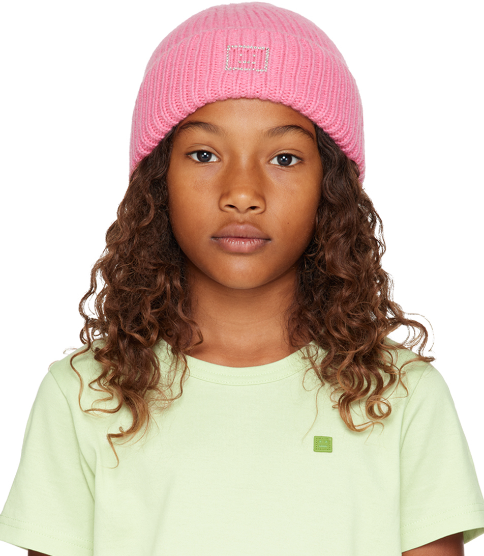 

Детская розовая шапочка с логотипом и изображением лица Acne Studios