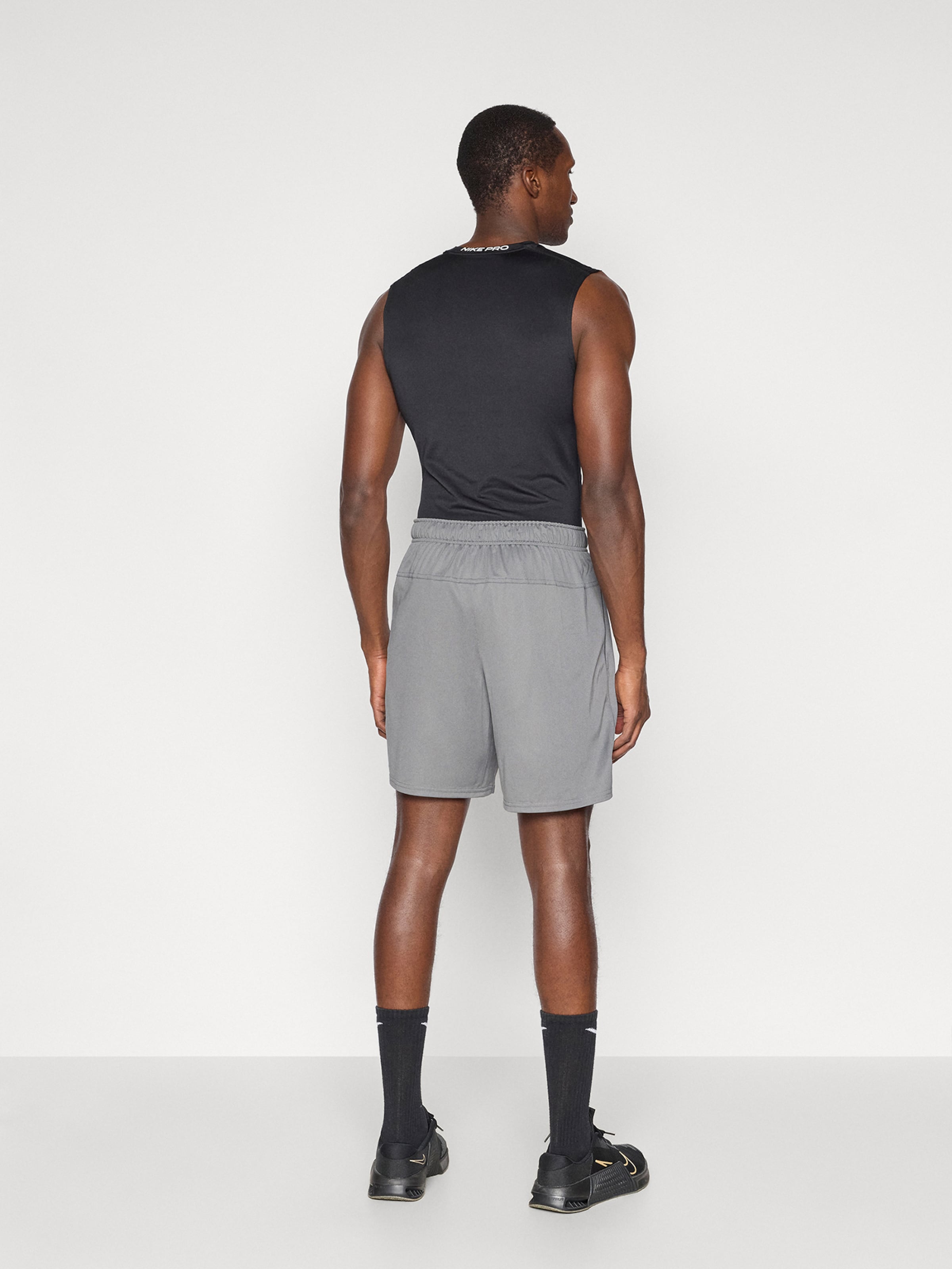 NIKE Спортивные шорты для тренировок 'FLEX' в сером цвете — фото 3
