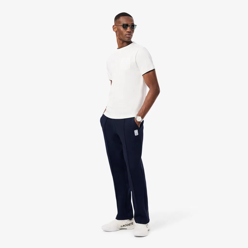 Мужские теннисные брюки Heritage тёмно-синие от Lacoste — фото 4