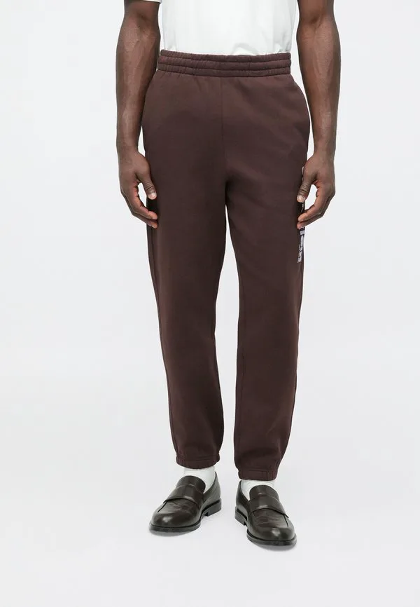 Ретро-Спортивные штаны с графическим принтом Calvin Klein, Rich Brown