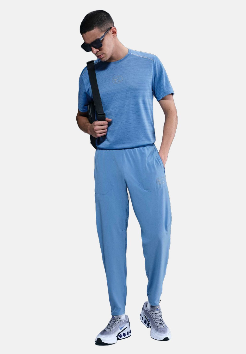 

Спортивные штаны AIR Nike Sportswear, синий