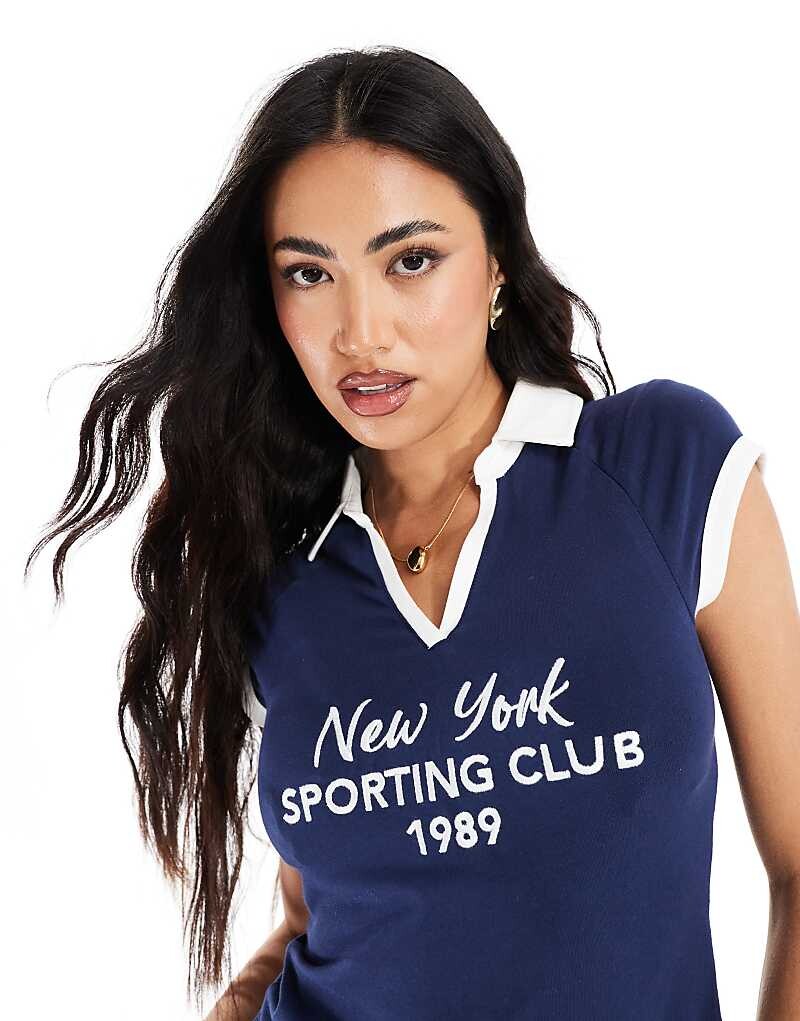 

Темно-синий укороченный топ-поло с принтом «Нью-Йорк» ASOS DESIGN