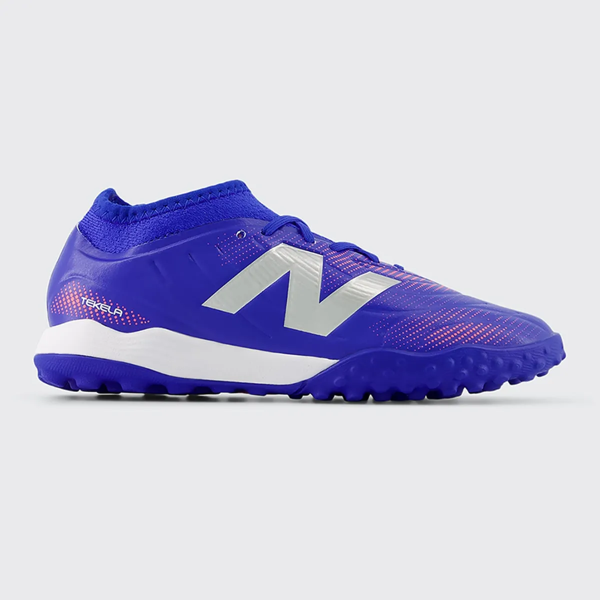

Детские футбольные бутсы TEKELA TEAM LOW LACED TF V5 New Balance, темно-синий/розовый