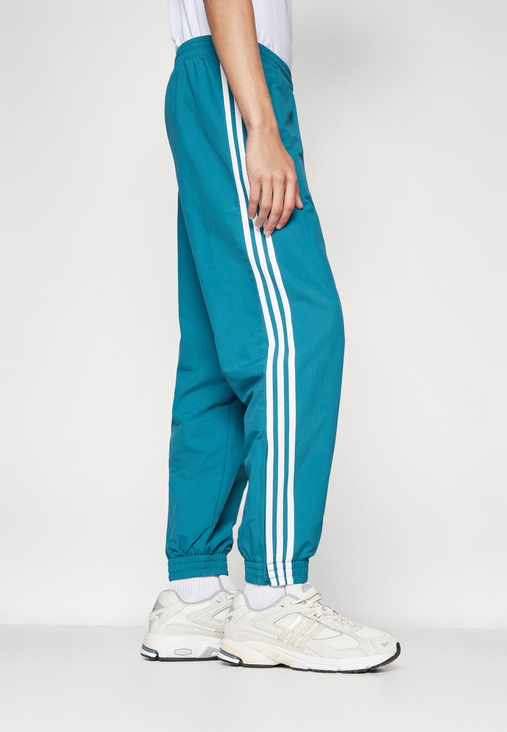 

Спортивные штаны adidas Originals, устаревший бирюзовый цвет