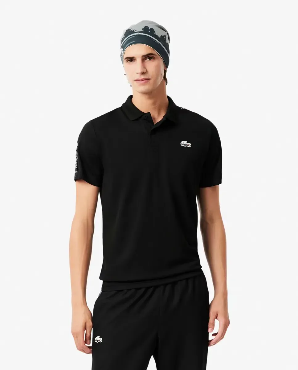 Lacoste Мужская спортивная поло с крокодилом и пейзажем Ultra-Dry черного цвета с коротким рукавом