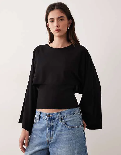 

Вязаная накидка Mango черного цвета