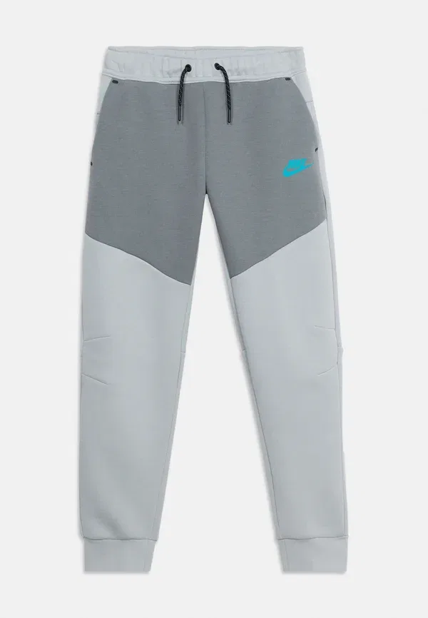 Брюки с отражающими элементами Tracksuit bottoms Nike Sportswear, wolf grey/smoke grey/black, черный/серый — фото 3