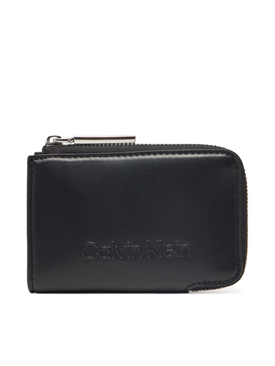 

Женский кошелек Embossed Logo Zip Cardholder K60K613157 Calvin Klein, черный