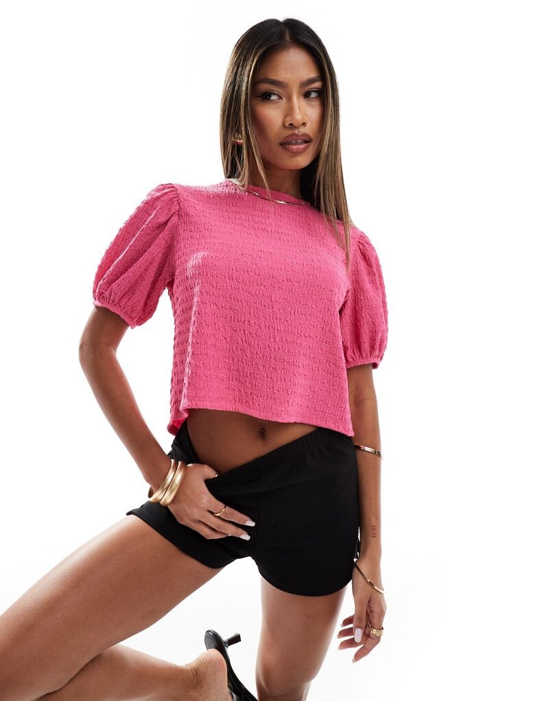 

ASOS DESIGN – розовый топ с бретельками на шее, объемными рукавами и объемной баской