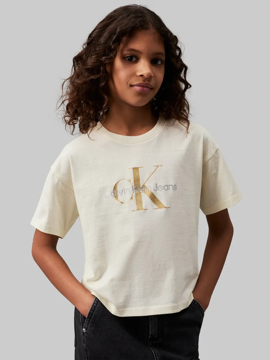 

Футболка Calvin Klein Jeans "GLITTER MONOGRAM BOXY SS T-SHIRT", для детей до 16 лет, со блестящей фирменной этикеткой, цвет Afterglow