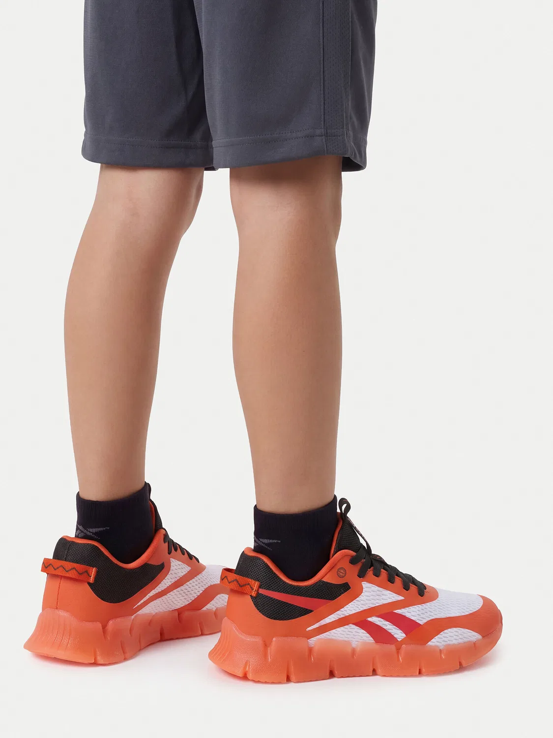 Кроссовки для мальчика GLOW ELASTIC LACE Reebok, оранжевый