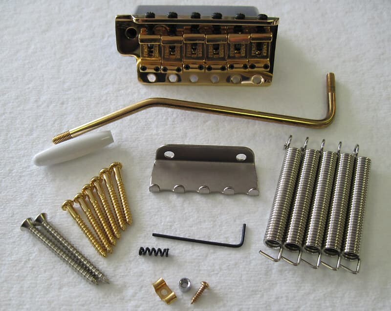 

Fender Original Vintage Stratocaster Tremolo Assembly Gold 0992049200 AVRI USA Vintage Strat Tremolo Bridge 099-2049-200