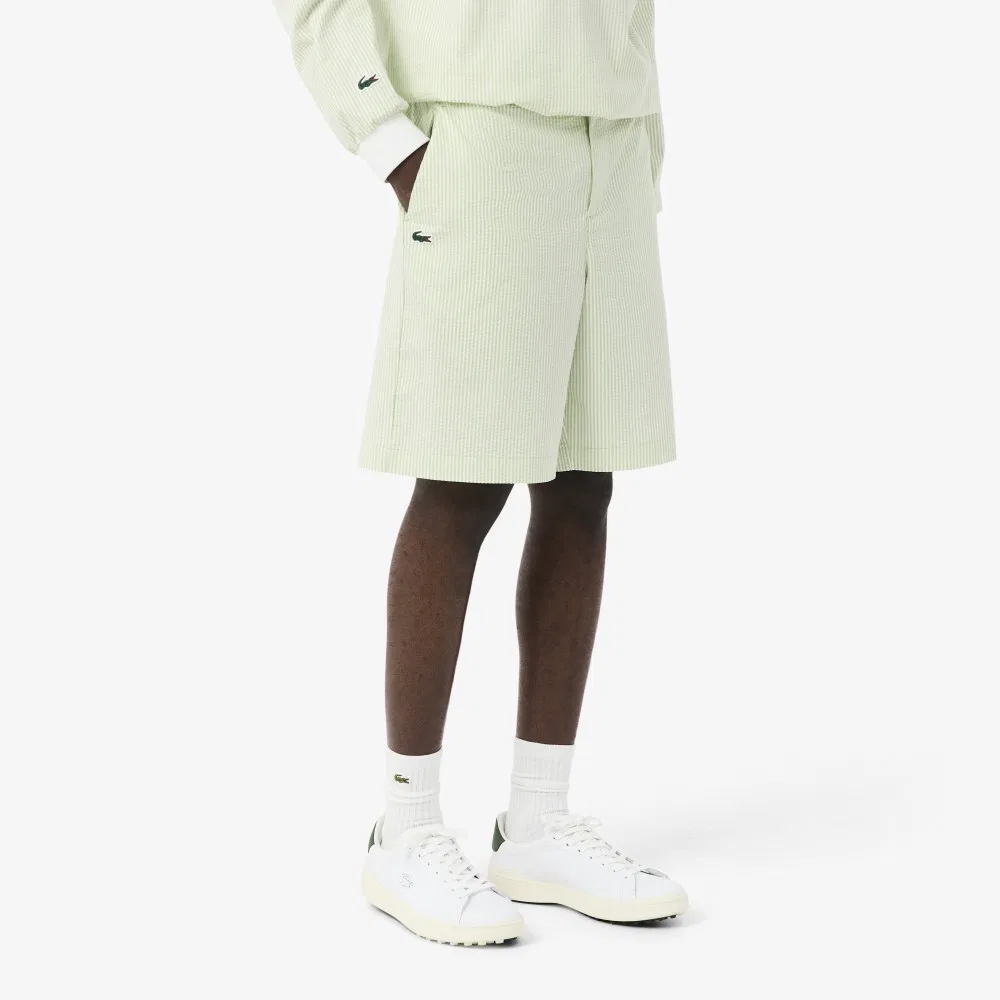 Мужские гольф-шорты из сирсакера жёлто-зелёные от Lacoste — фото 2