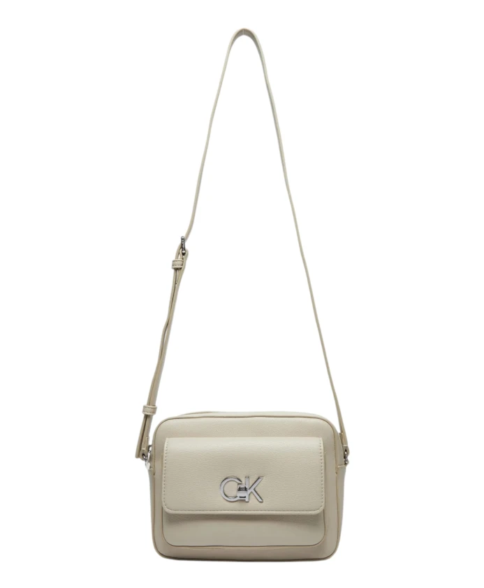 

Элегантная женская сумочка среднего размера с клапаном. Calvin Klein, серый