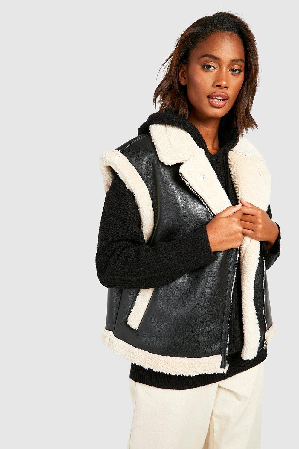 

Жилет из искусственной кожи с отделкой teddy Boohoo, черный