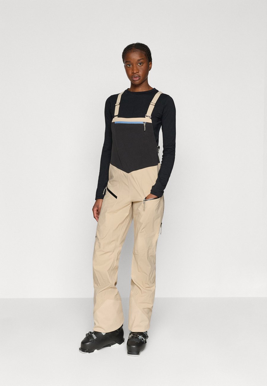 

Лыжные брюки Patagonia SNOWDRIFTER BIBS, Oar Tan/Beige