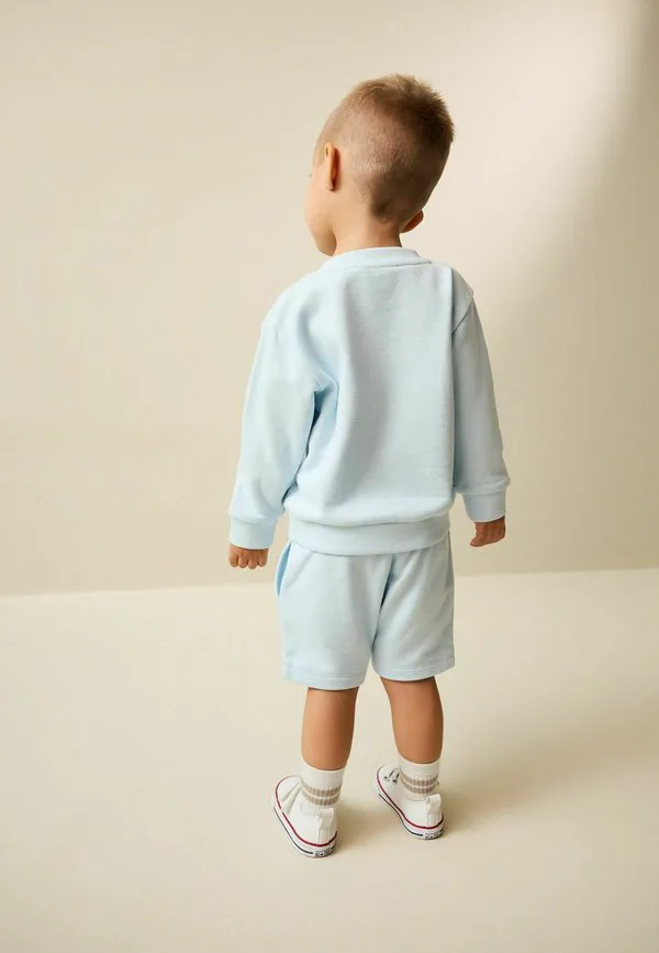 Однотонный спортивный костюм с круглым вырезом и однотонной отделкой. Next, Light Blue — фото 3
