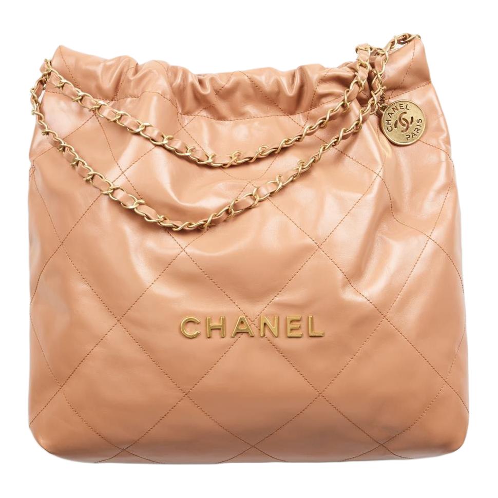 

CHANEL Блестящая телячья кожа с золотой металлической пряжкой ведро сумка женская темно-бежевая