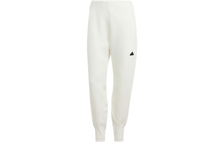 Трикотажные спортивные штаны ZNE женские, цвет Off White Adidas