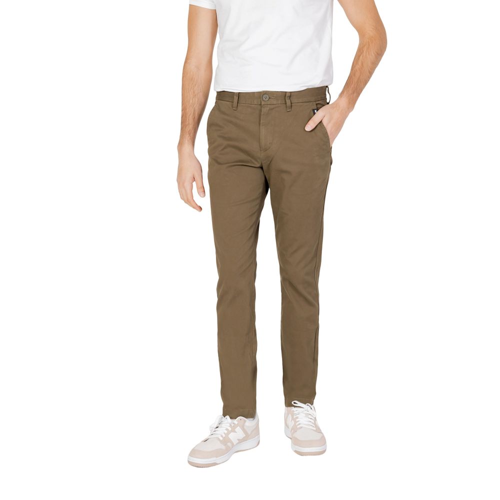 

Джинсы и брюки из зеленого органического хлопка Tommy Jeans