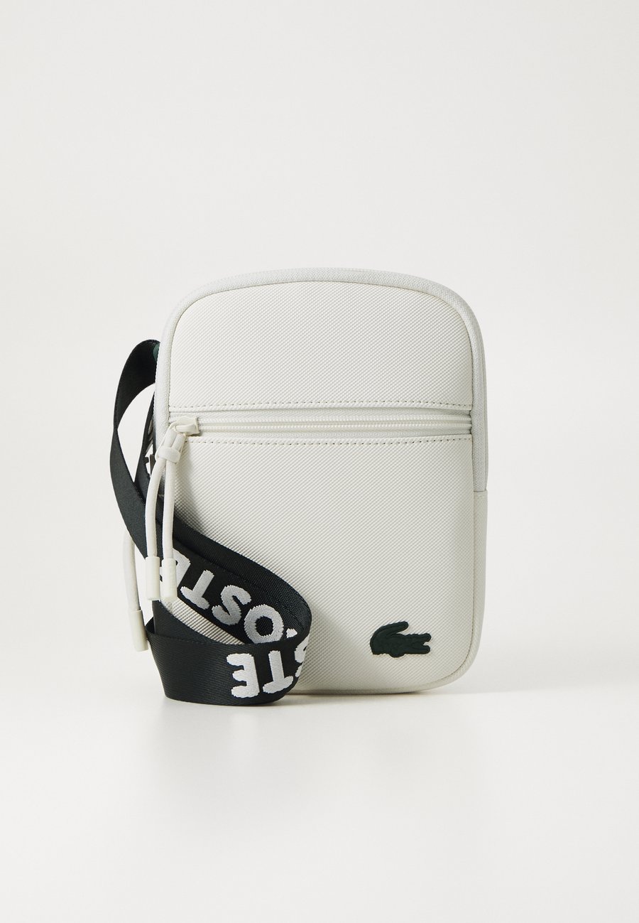 

Сумка кросс-боди Lacoste CROSSOVER BAG SEASONAL UNISEX, Farine/Off-White